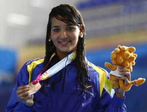 Venezuela's Andreina Pinto poses with her bronze medal after placing third at the women's 800m freestyle final at the Pan American Games in Guadalajara October 19, 2011. REUTERS/Jorge Silva (MEXICO - Tags: SPORT SWIMMING)