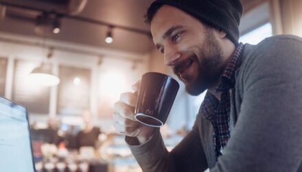 man surfing the net in cafe royalty free image 1664876293